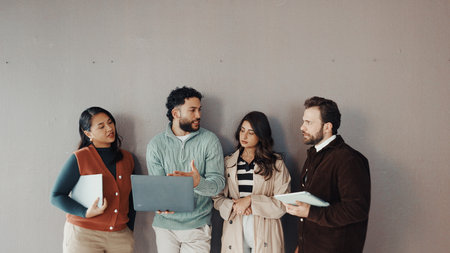 Business, people and talk with tablet in waiting room of job interview, sign up and company website. Staff, candidates and digital for research, online application and reading feedback of recruitmentの写真素材