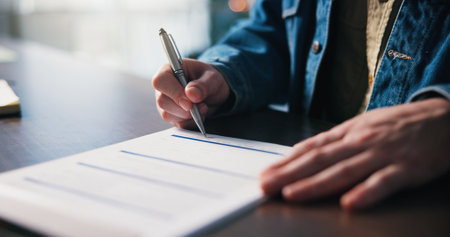 Office, approval and hands with documents, signing or agreement for terms or investment opportunity. Business, entrepreneur or person with legal paperwork, table and validation of funding applicationの写真素材