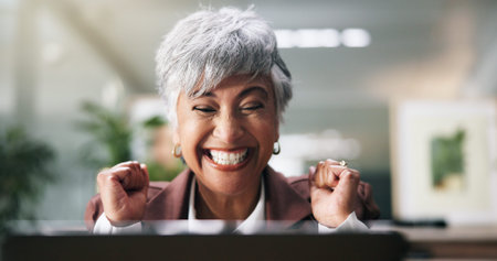 Business woman, laptop and happy with celebration for trading profit, financial success and goals....