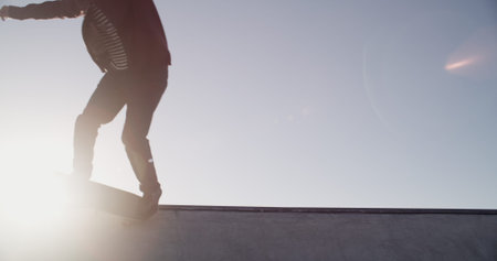 Legs, skateboard and ramp at park, sky and mockup space with balance, exercise and outdoor in...