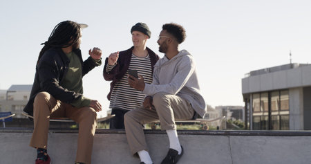 Happy men, skateboard or phone with friends for social media, network or connection in city. Male...