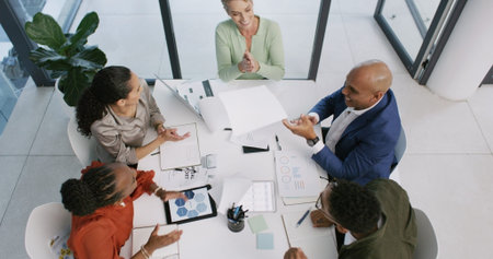 Applause, meeting and business people in office with documents for finance report with good news....