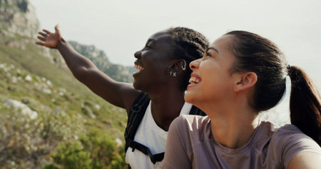 Women, friends and selfie with hiking, mountains and show location on live stream with smile in...
