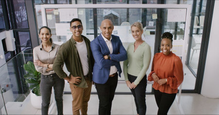 Portrait, group and creative people in office with career pride, about us and media agency. Above, staff and employee confidence with teamwork, manager support and leadership for article publicationの写真素材