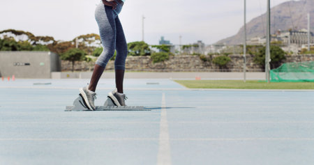Running, start and legs of woman on race track for fitness, competition practice and workout. Begin,...
