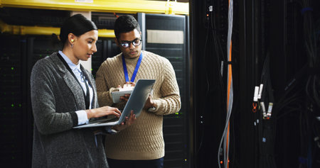 Server room, team and people with laptop for planning, software update or system maintenance....