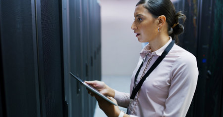 Inspection, mainframe and tech support with woman in server room for cybersecurity or maintenance....