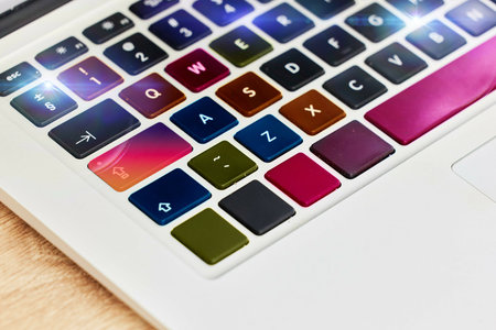 Laptop keyboard, color and technology for work, business and internet on a table. Digital, creative...