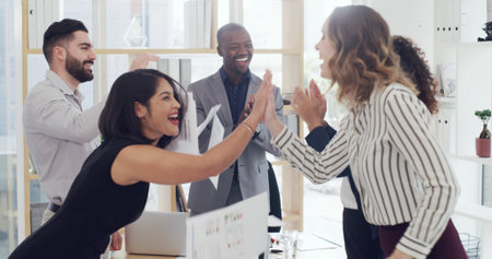 High five, teamwork and business people in office with finance partnership, celebration or support. Happy, success and group of financial advisors with good news, target or investment deal together.の写真素材