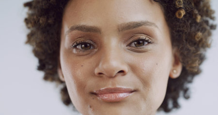 Portrait, woman and skincare for shine, aesthetic and wellness on studio background. African model,...