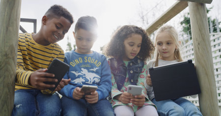 Friends, kids and smile with tech in park for social media, fun and break in backyard. Children,...