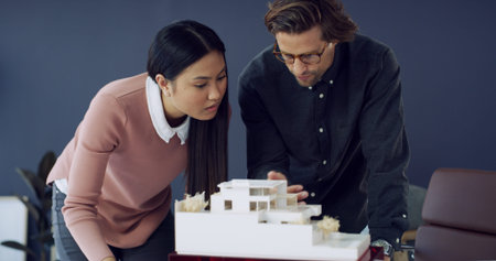 Team, architecture and people planning with 3d model, house design or building. Meeting, architect...