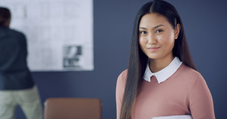 Business, woman and architect with portrait in office for career pride, about us and real estate. Asian person, confident and ambition of property development, project manager and building renovationの写真素材