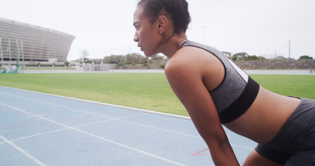 Breathing, exercise and tired with woman in stadium for challenge, training or workout fatigue....