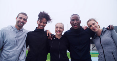 Exercise, hug and portrait of athlete friends in stadium for bonding, competition or support....