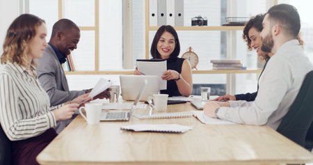 People, laugh and discussion with documents, boardroom and collaboration for investment opportunity. Happy, team and group with paperwork, conversation and planning for proposal or strategy in officeの写真素材