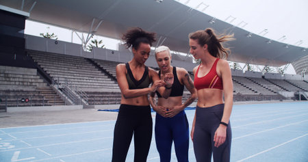 Happy woman, team and smart watch on track for training with timer, stats and results for workout....
