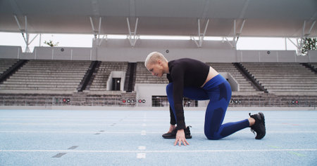 Start, race track and woman with run for sport, competition or athlete on your mark. Challenge,...