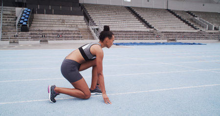 Fitness, ready and start of race with woman in stadium for challenge, competition or sports...