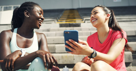 Friends, phone and women in stadium for fitness, exercise and training for social media on steps....