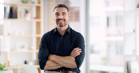 Crossed arms, smile and portrait of businessman in office with confidence for finance career. Happy, corporate and male financial manager from London with pride for job development in workplace.の写真素材