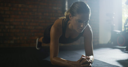 Fitness, gym and woman with plank exercise for abs, challenge and training for health in sports...