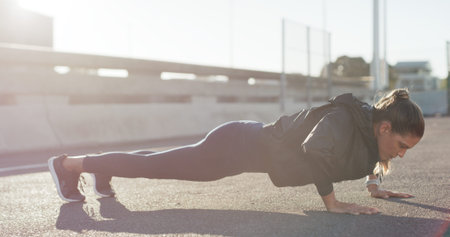 City, push ups and woman on road, fitness or workout routine for core strength, healthy and outdoor....