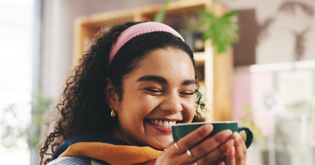 Coffee, smile and woman on sofa in home with calm, peace and morning in living room for break....