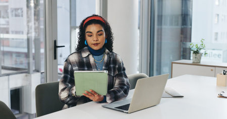 Woman, tablet and laptop at startup with thinking, review and reading report at media company....