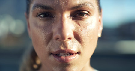Fitness, tired and woman with portrait in city for workout recovery, exercise fatigue and sweating....