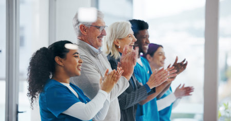 Clapping hands, board meeting and doctors in clinic with healthcare funding opportunity. Applause,...