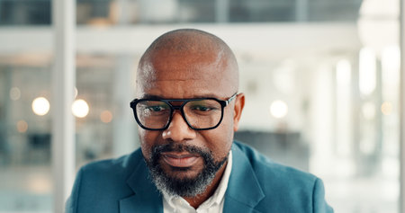 Glasses, reading and black man in office with research for finance report with company budget....