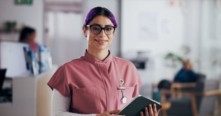 Medical, portrait and tablet with nurse woman in clinic for insurance, records or schedule. App,...