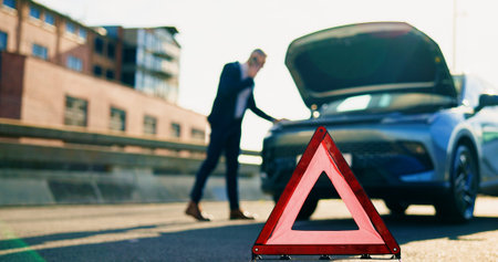 Warning sign, car breakdown and triangle on road with problem, fail or roadside assistance....