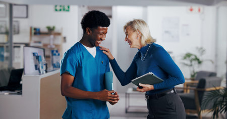 Nurse, man and laughing with hospital manager for medical planning, schedule update and funny joke....