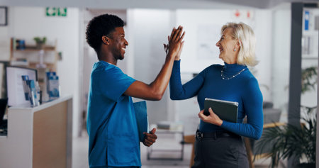 High five, nurse and woman with support in hospital, happy with success or motivation for healthcare...
