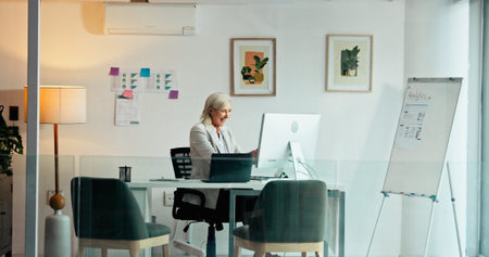 Business, smile and woman in office, computer and investment with profit growth. Mature person,...