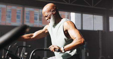 Fitness, black man or exercise bike at gym for cardio, workout challenge or burning calories....