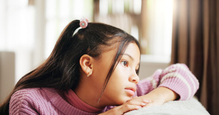 Home, thinking and girl with daydreaming, kid and sad with idea, thoughtful and foster care....