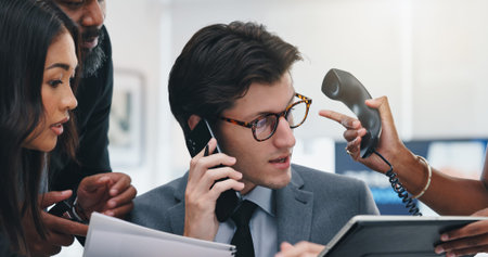 Man, multitasking and chaos with phone call at office, notification and stress with group at agency....