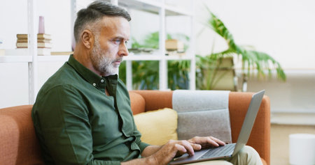 Laptop, research and businessman in office with email, communication or contact for creative...