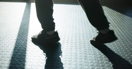 Feet, athlete and fitness with person at gym for preparation, start exercise and sports training....