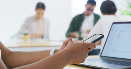 Hands, office or businessperson with phone for online feedback or texting for message. Coworking,...
