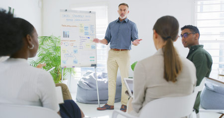 Man, presentation and brand communication at meeting for talk, review or graphs on board at company....