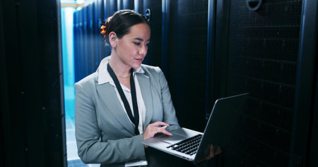 Engineering, laptop and woman in server room for cybersecurity, network maintenance or programming....