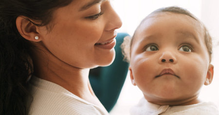 Home, relax and mom with baby on sofa for bonding, loving relationship and child development....