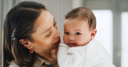 Love, bonding and mother with baby in home for trust, parenting comfort and happy together....