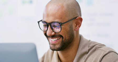 Laptop, research and man with glasses, office or online for troubleshooting, employee and debugging....