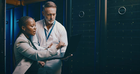 People, laptop or server room with cyber security, inspection or feedback with engineering. IT...