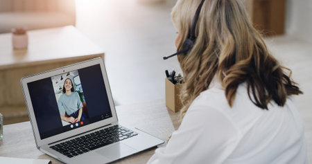 Psychologist, person and laptop for video call at house for consultation, therapy session and...